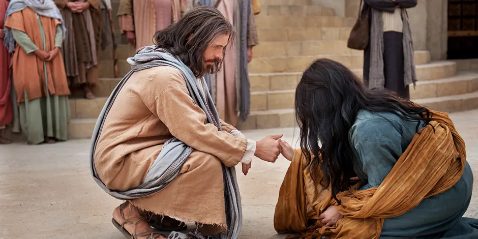 jesus with the woman caught in adultery after writing on the ground